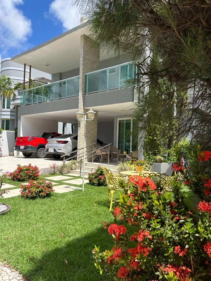 Casa com 04 dormitórios à venda, 400m² por R$ 3.090.000 - Port...