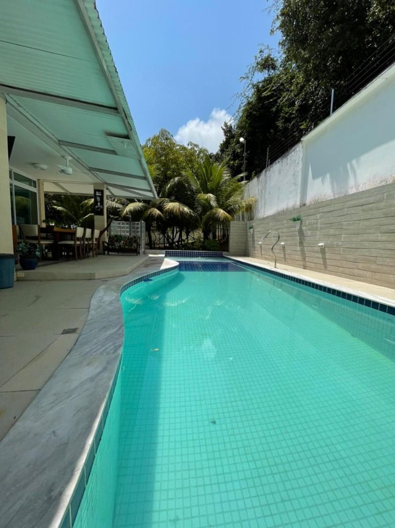 Casa com 05 dormitórios à venda, 450m² por R$ 3.000.000 - Port...