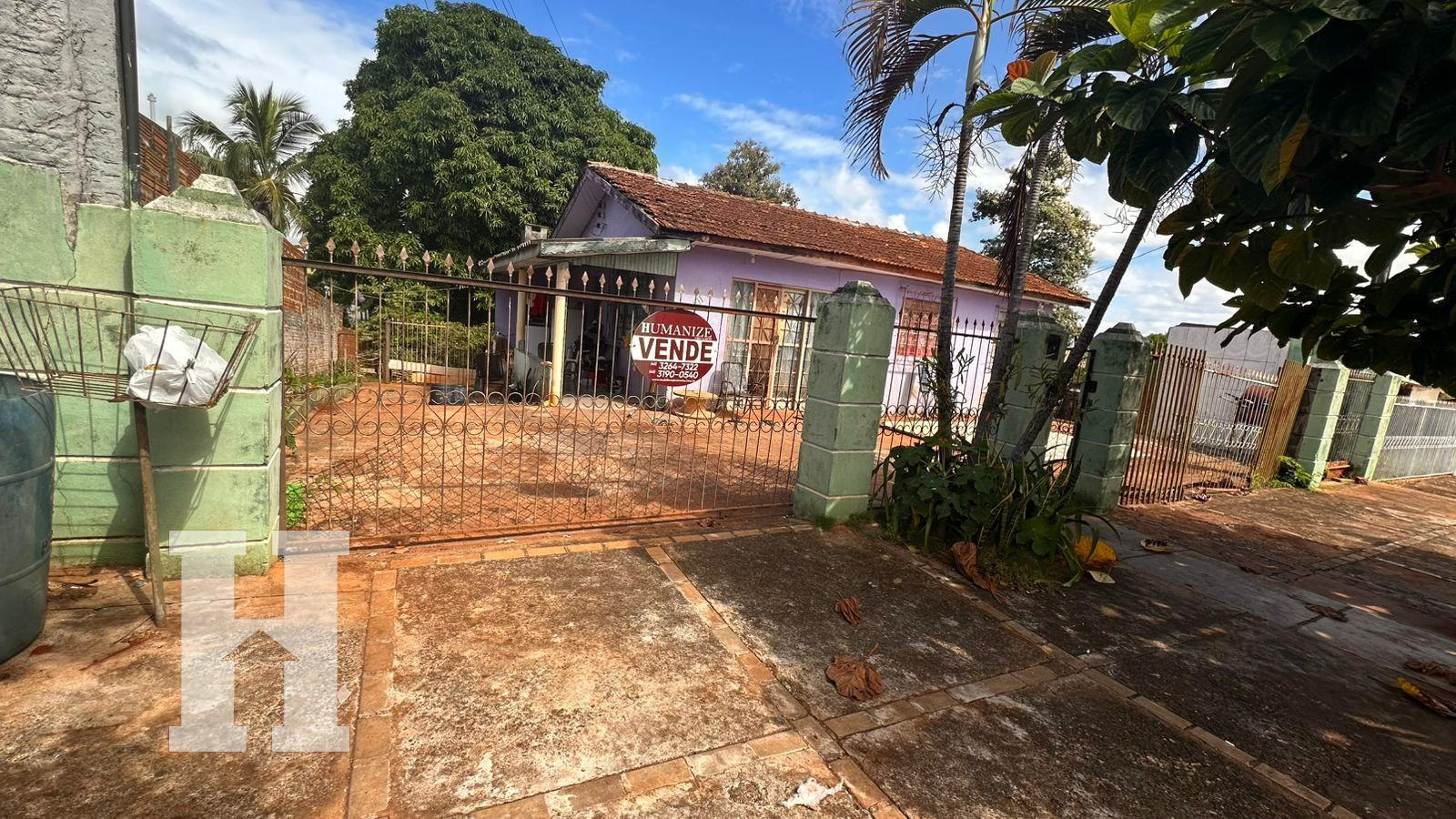 Lote com casa