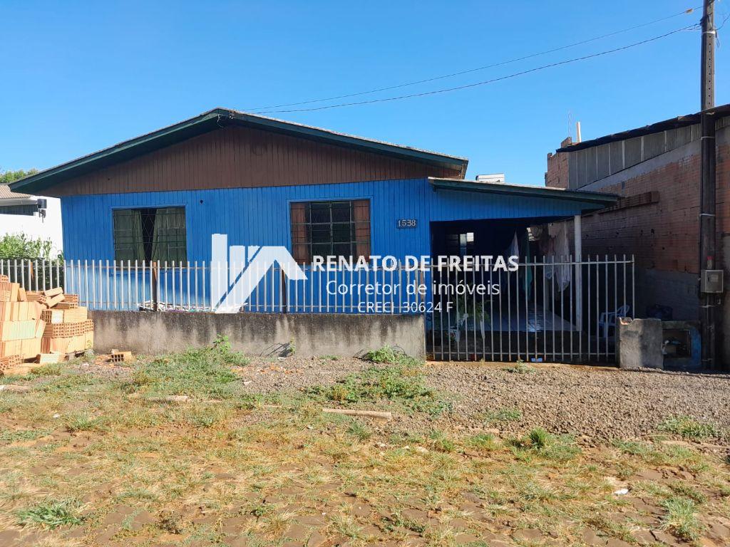 Terreno contendo casa e barracão